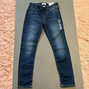 Girls brand new Size 12 mid rise pull on Jeggings dark blue wash. Super stretch.
